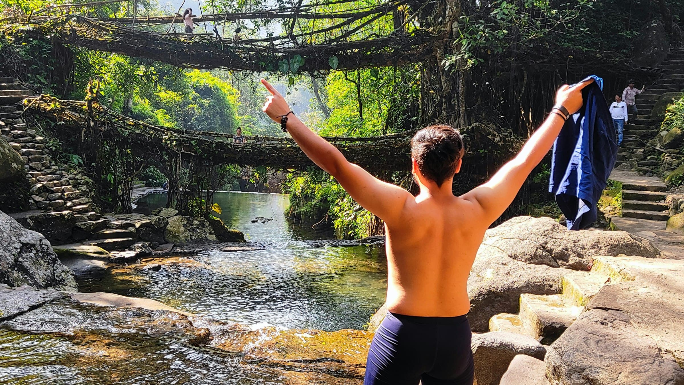 The Double Decker Living Root Bridge at Nongriat, grown from fig-tree roots trained across the river.