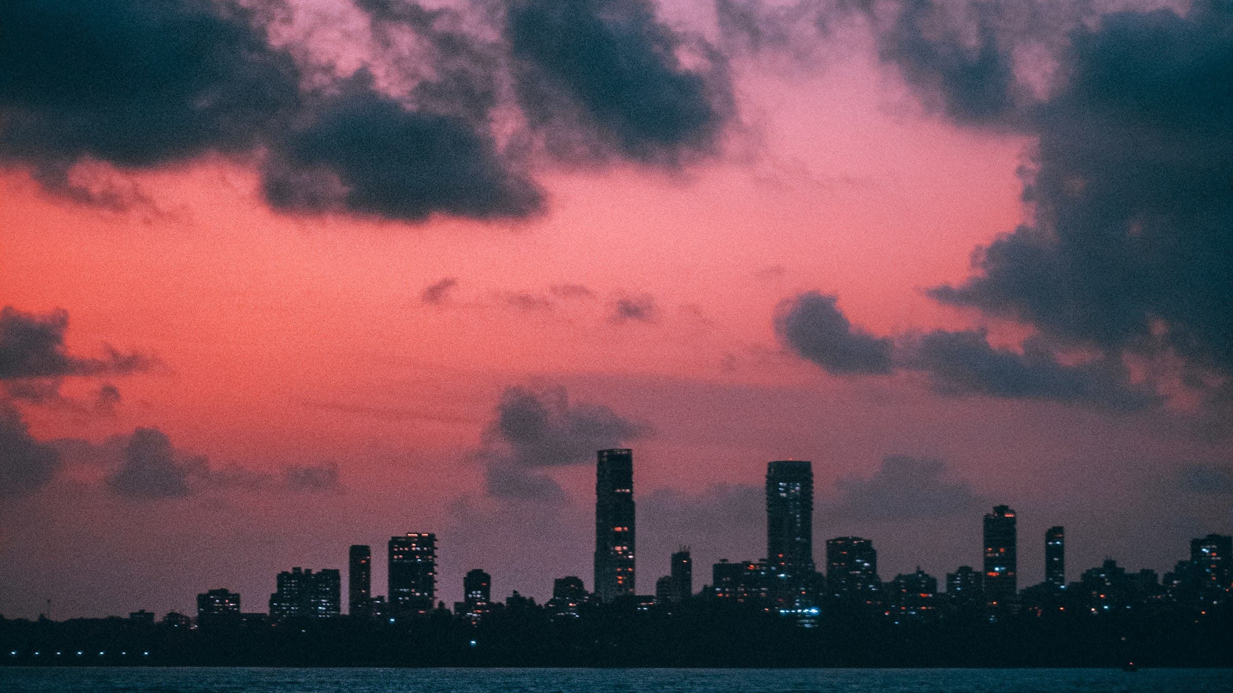 Mumbai's skyline viewed from Marine Drive at dusk