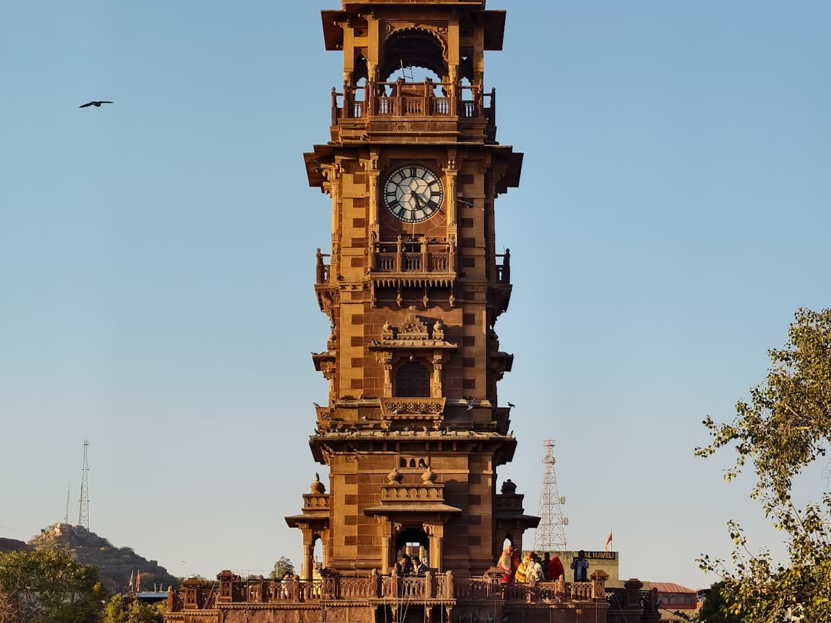 Historic clock tower in a bustling city square