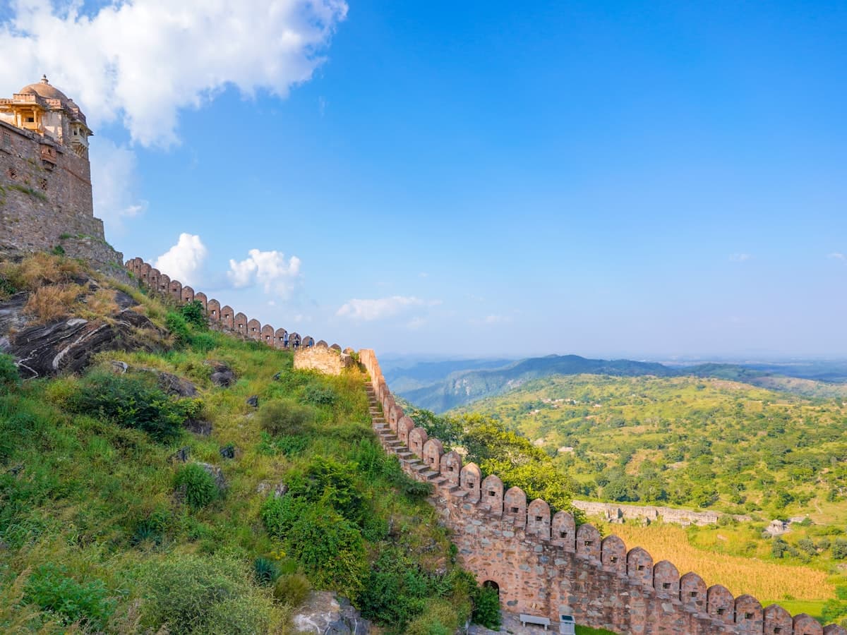A long stone wall running along a hill
